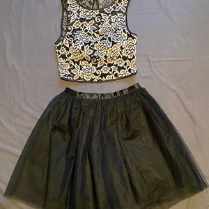 Two piece black and cream colored dress. Like new.